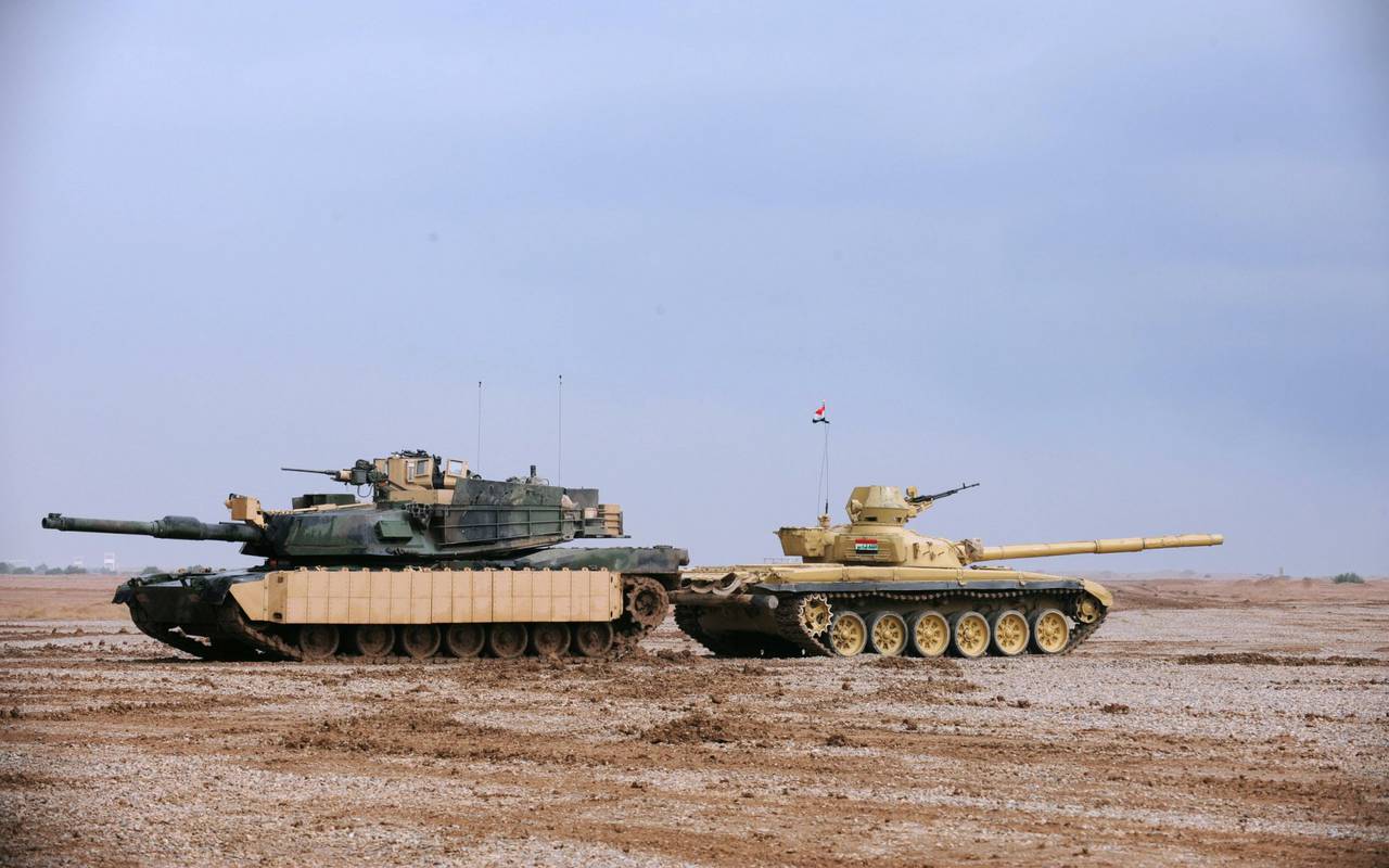 Left Abrams and Right T-72